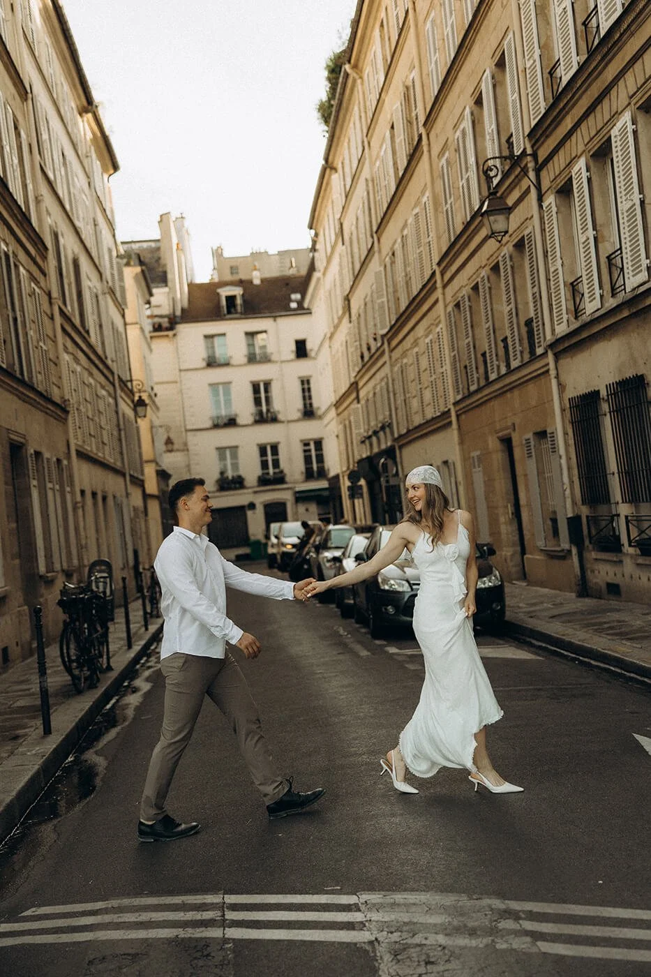 Candid couple walking on the streets, lifestyle engagement photography in the heart of Paris.