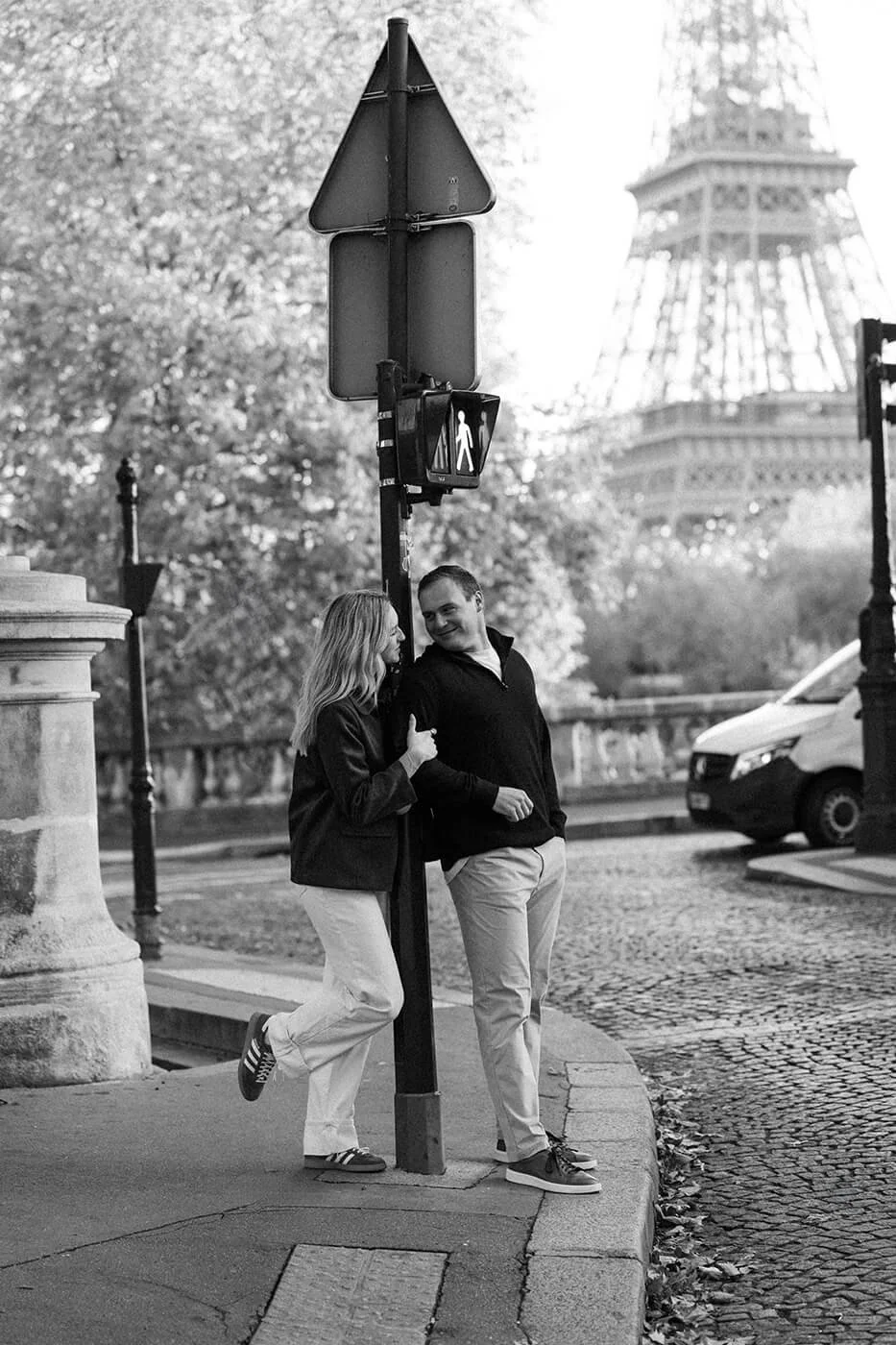 Black and white Paris couple session with the Eiffel Tower in the background.