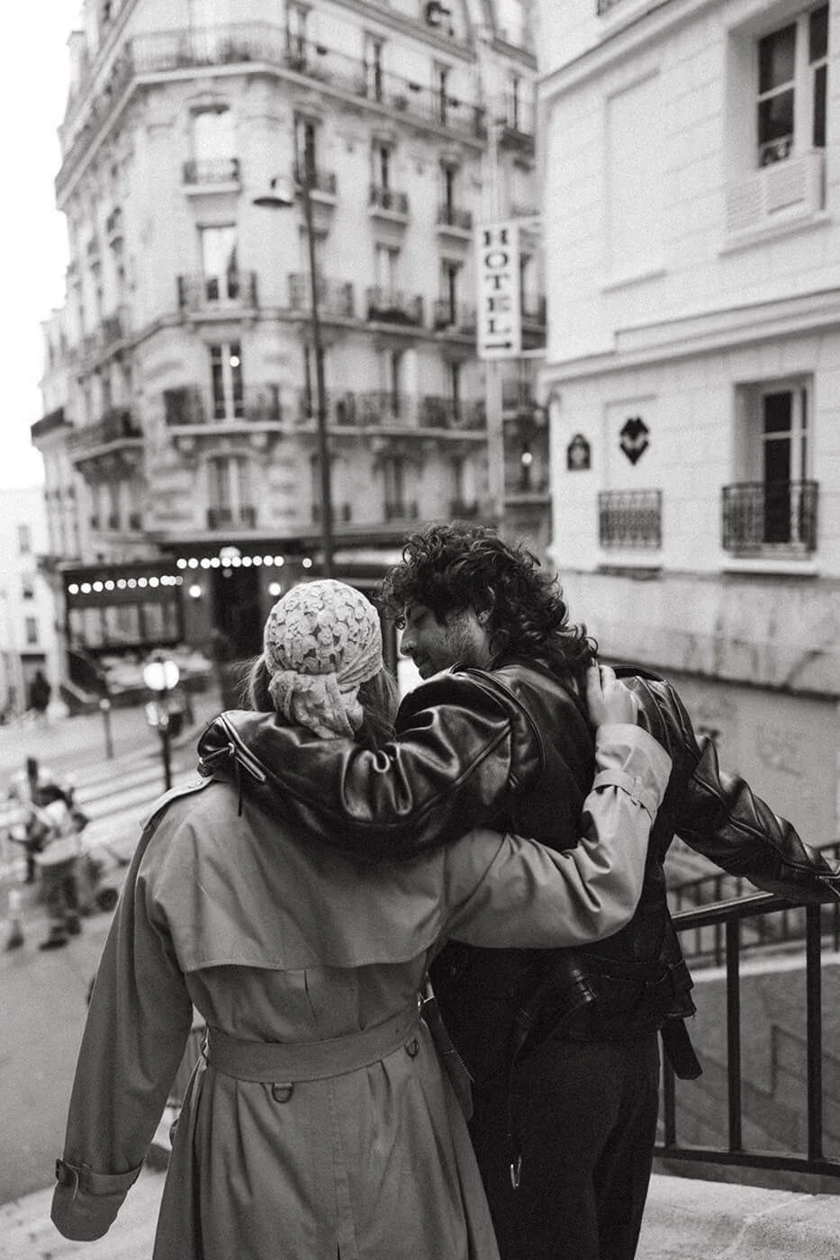 Strolling in Montmartre by the couple during their engagement photo session.