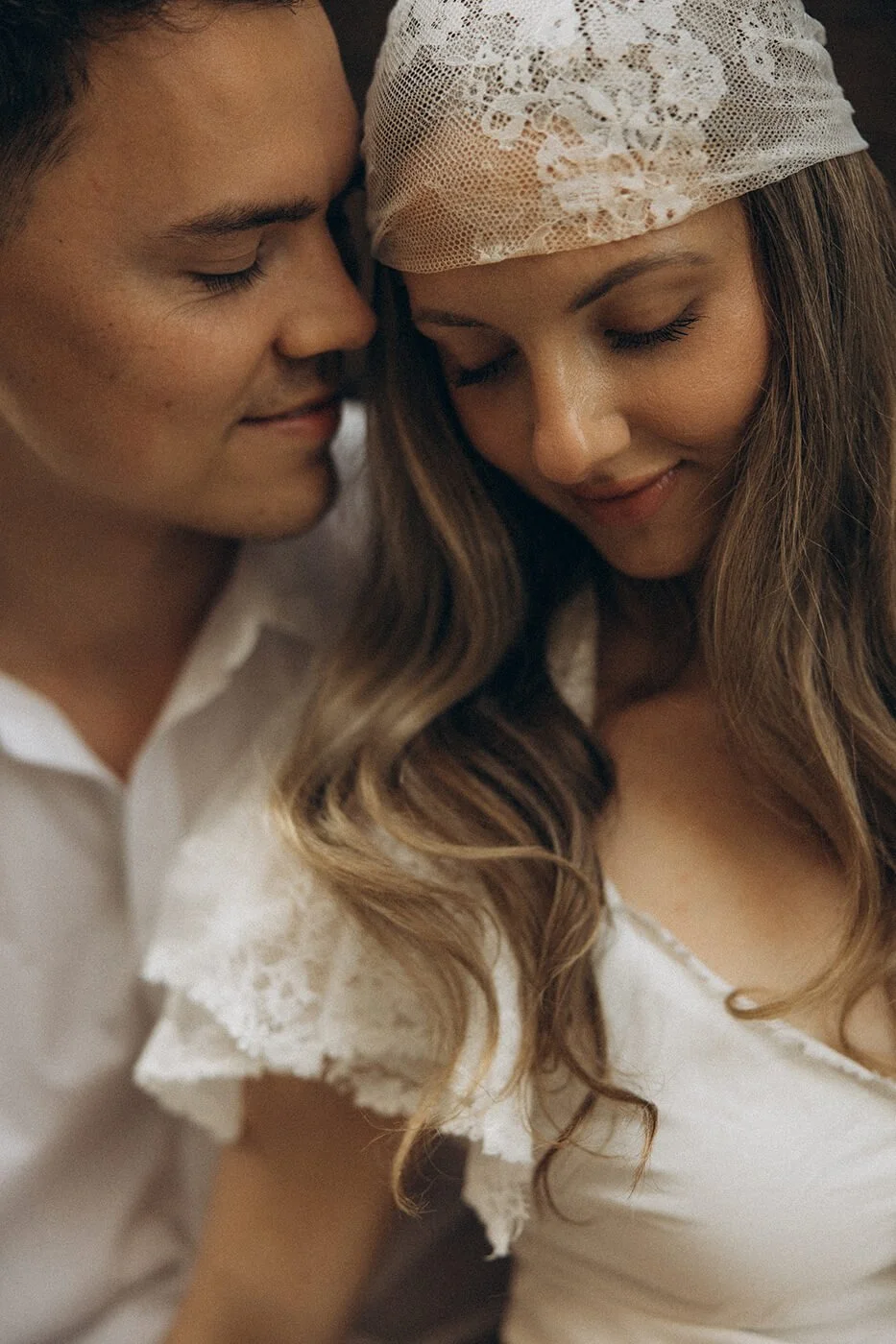 Close-up romantic portrait of a couple during their Paris elopement, emotional and timeless engagement photography.