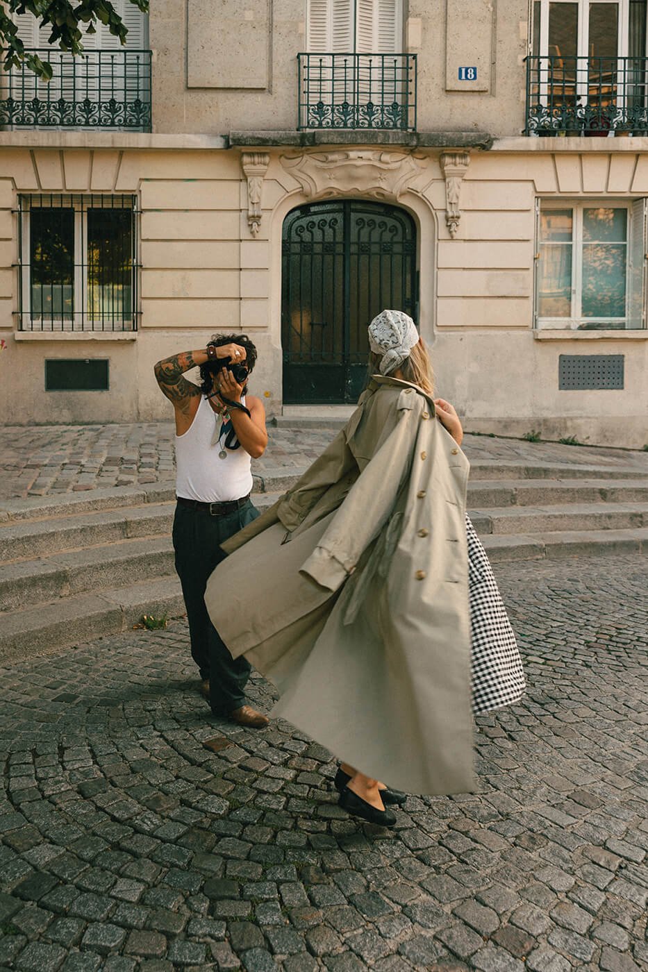 cinematic-paris-couple-twirling-cobblestones.jpg