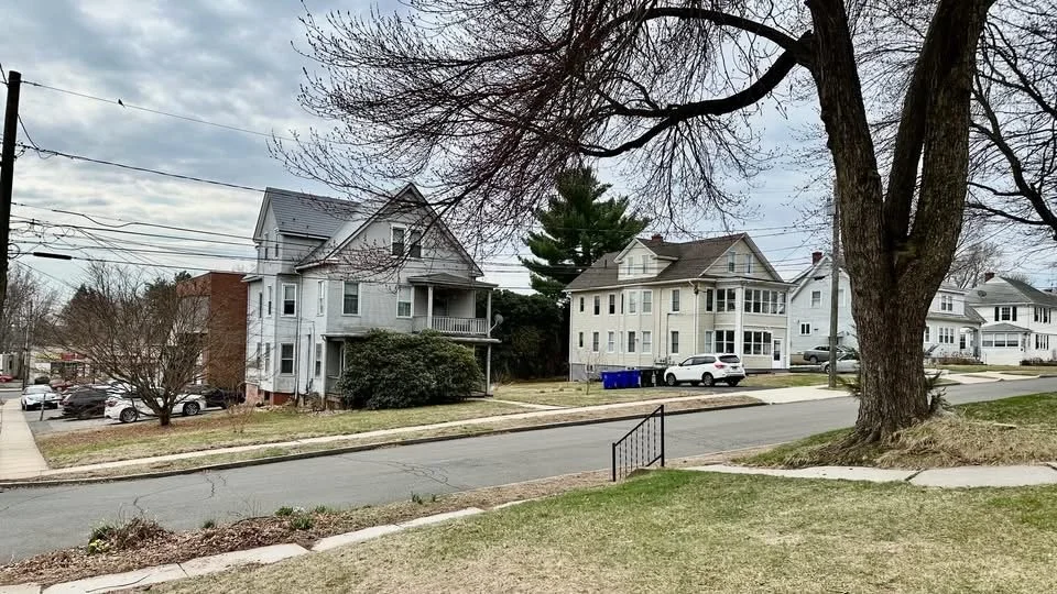 1939 - Two houses that were previously located on the current site of the AC Petersen Restaurant were relocated to Washington Circle, directly behind the Park Road property.