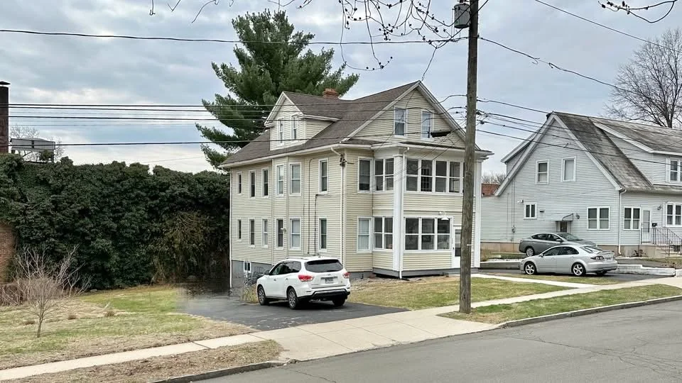 1939 - Two houses that were previously located on the current site of the AC Petersen Restaurant were relocated to Washington Circle, directly behind the Park Road property.