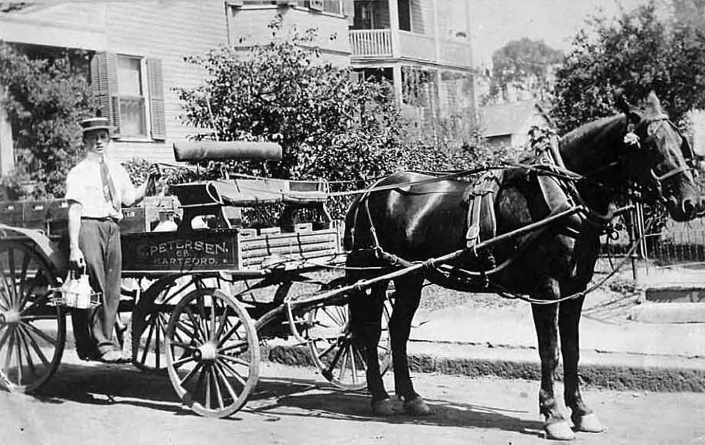 A young Andrew Petersen delivering milk in Hartford in 1914