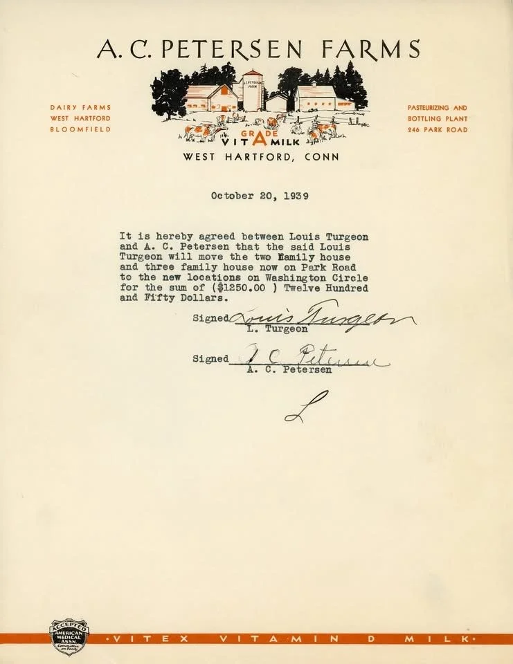 1939 - Two houses that were previously located on the current site of the AC Petersen Restaurant were relocated to Washington Circle, directly behind the Park Road property.