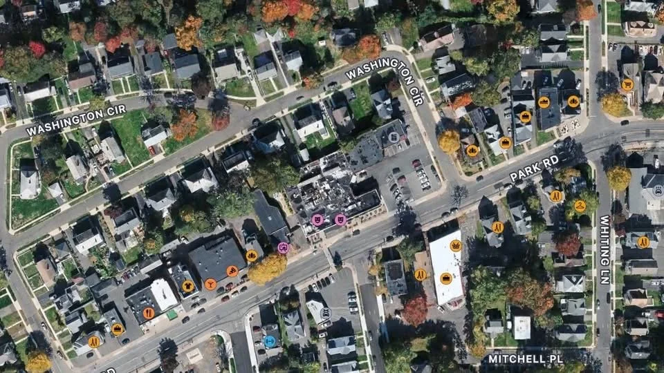 1939 - Two houses that were previously located on the current site of the AC Petersen Restaurant were relocated to Washington Circle, directly behind the Park Road property.