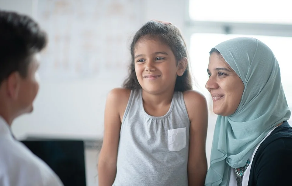 mulsim-girl-and-mother-with-pediatricianresized.jpg