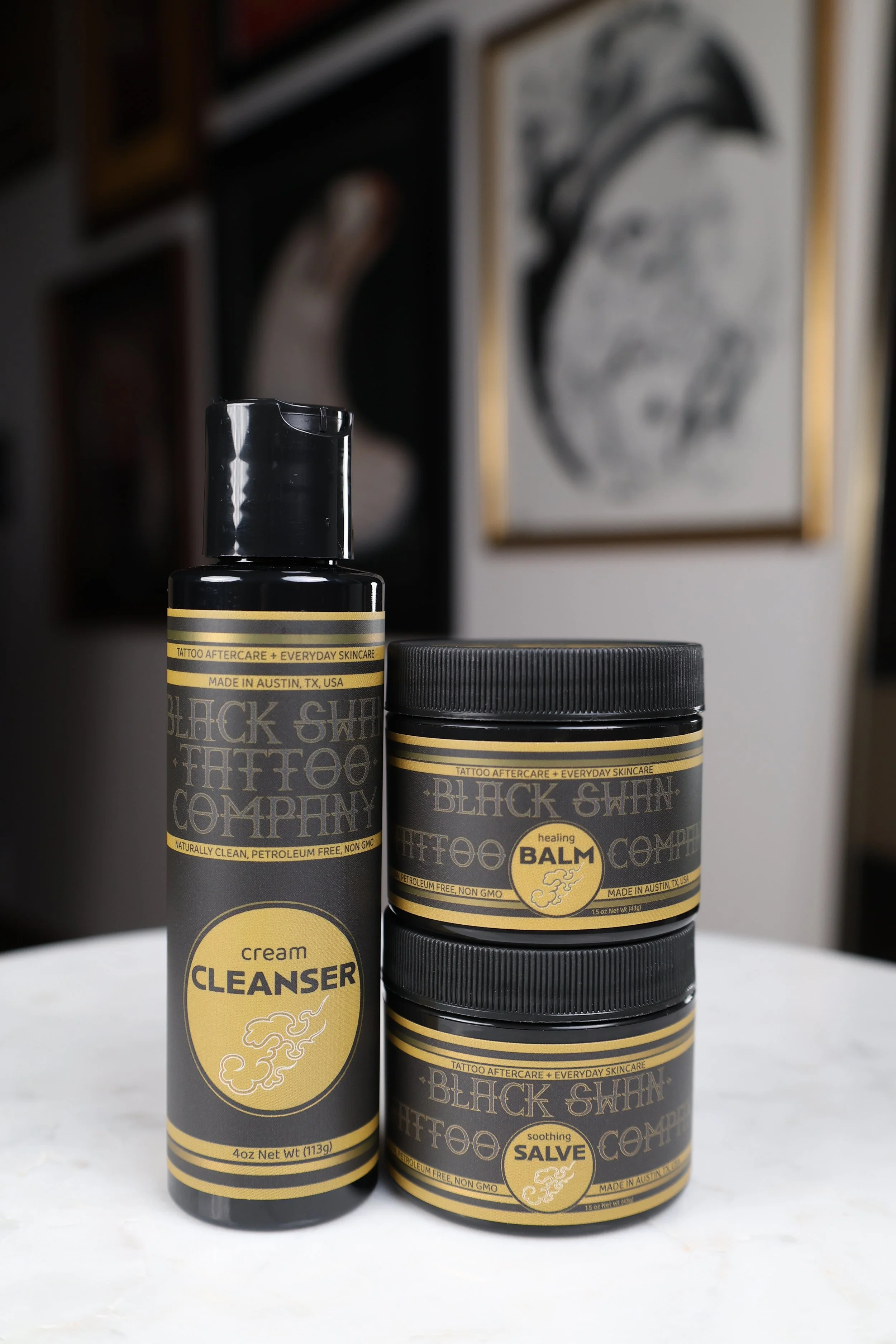 Black Swan petroleum free tattoo aftercare product lineup close view