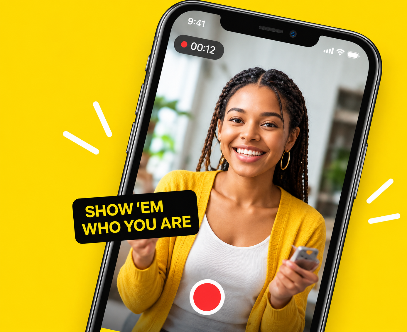 A woman with braided hair and hoop earrings smiling while taking a selfie on her smartphone, with a yellow background and a speech bubble that says "SHOW 'EM WHO YOU ARE."