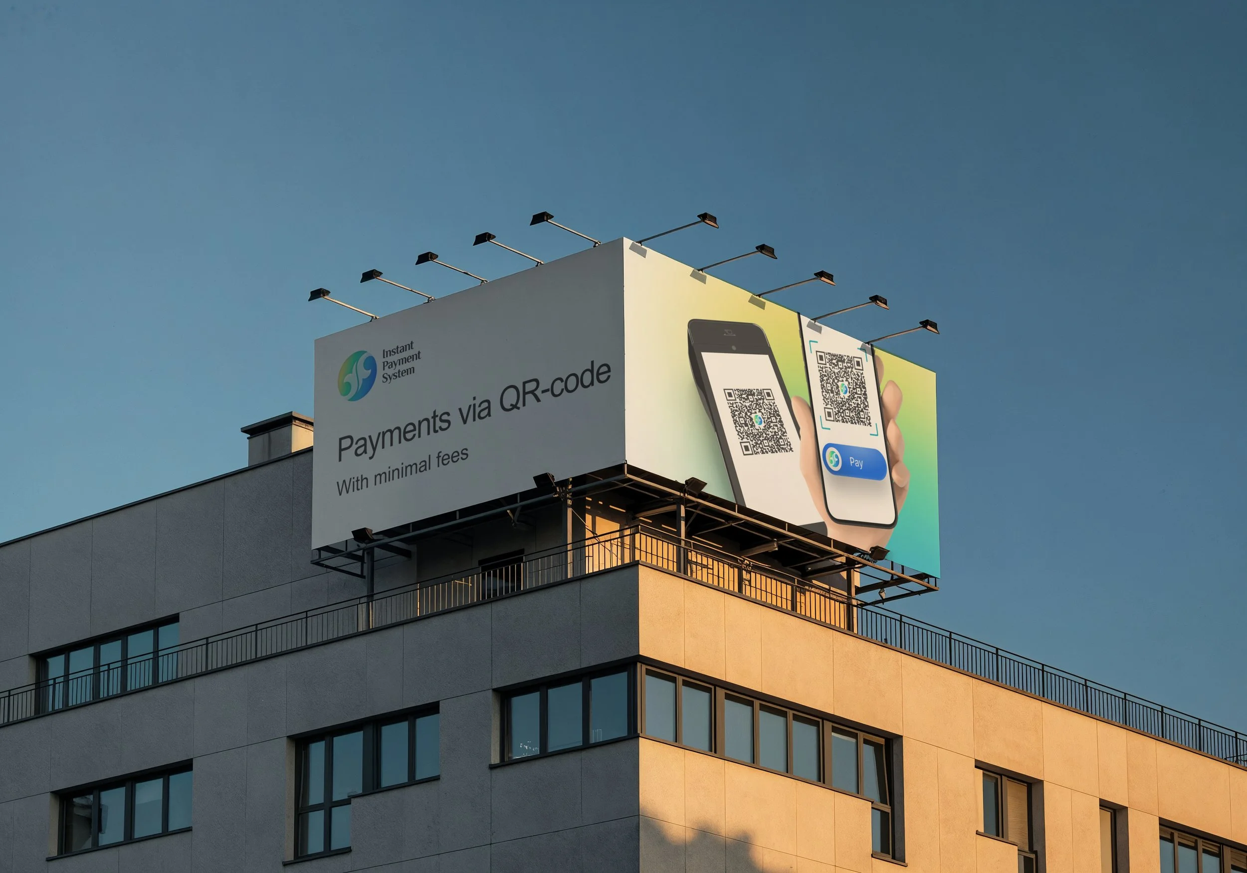 Billboard on a building advertising instant payment system via QR code with a smartphone image and a blue sky background.