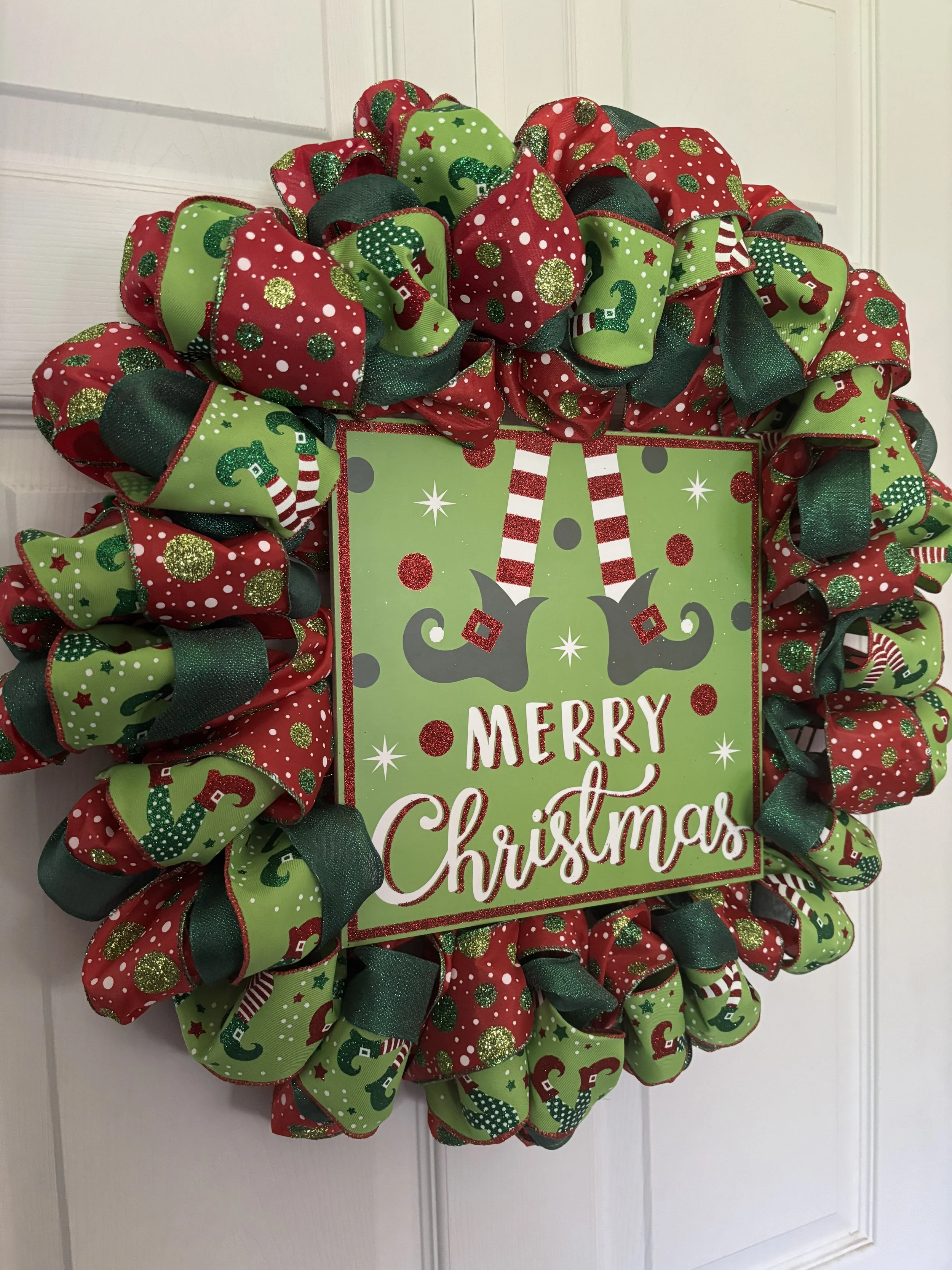 Merry Christmas Elf Feet Left Side.JPG