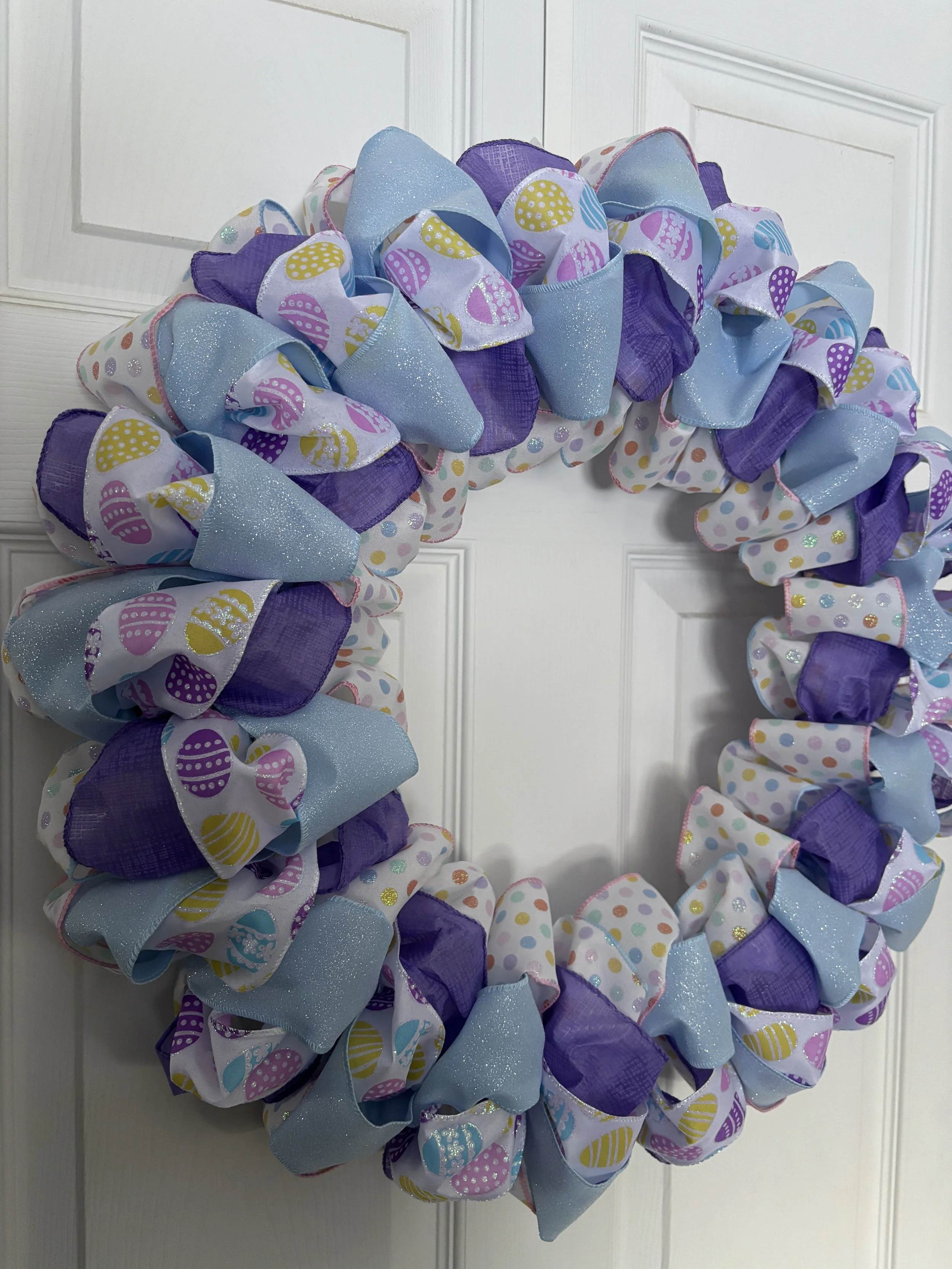 White, Purple Blue with Easter Eggs Ribbon Wreath Left View.JPG