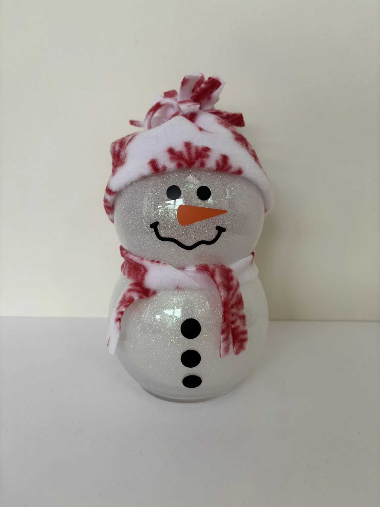 Festive Snowman Figurine with Cozy Hat and Scarf