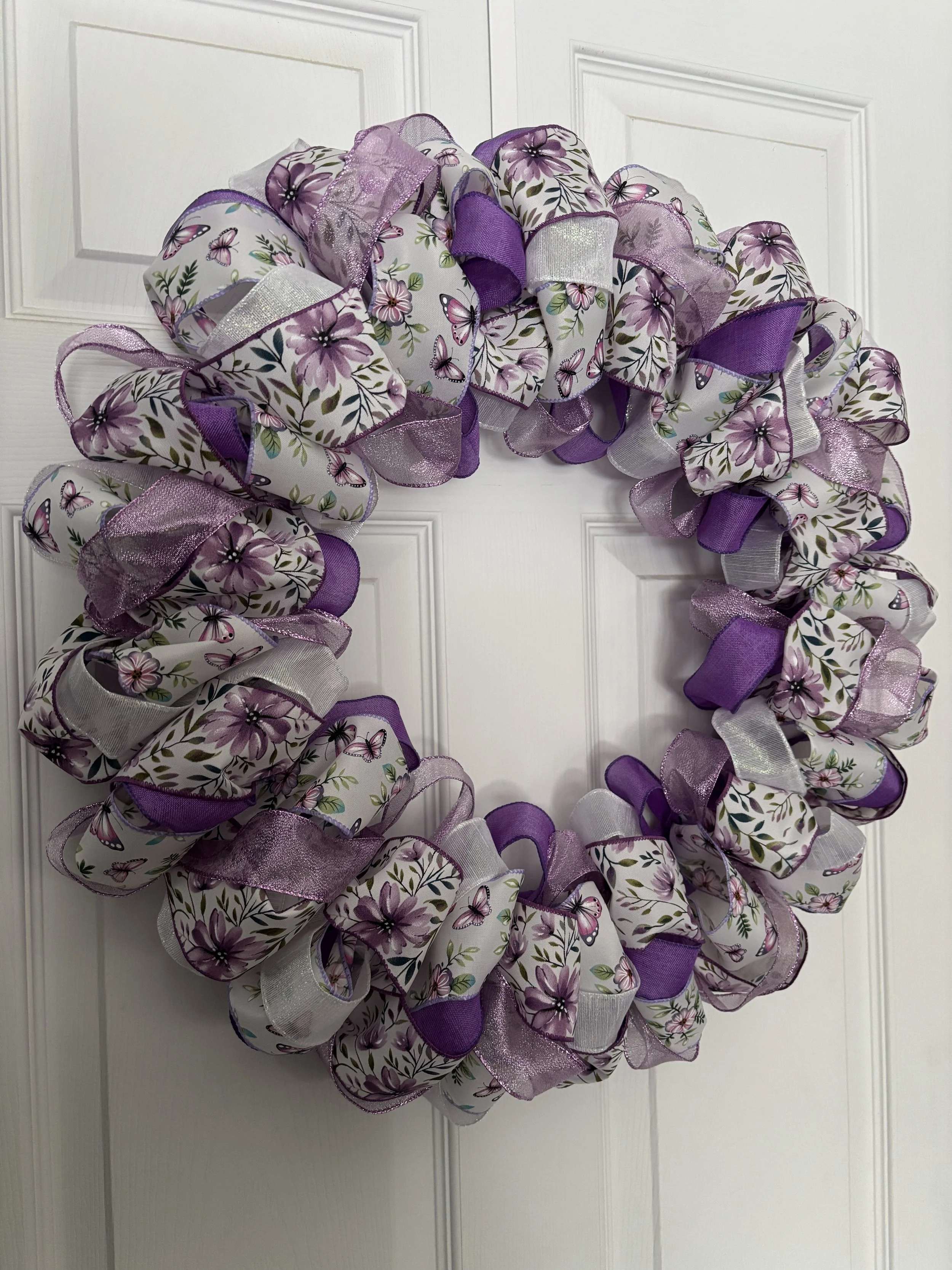 White and Purple Ribbon Wreath with Flowers Left View.JPG