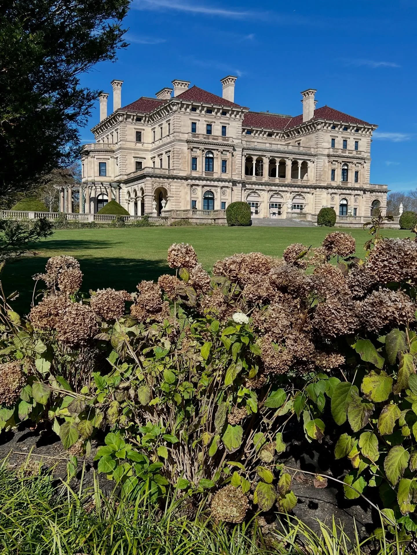 Can you imagine mahjong in Newport, RI in the Gilded Age? It must have been quite the event (like everything else!)

While touring The Breakers, we stumbled upon a gorgeous game table in the library. Was it for mahj? Maybe! Another table was displaye