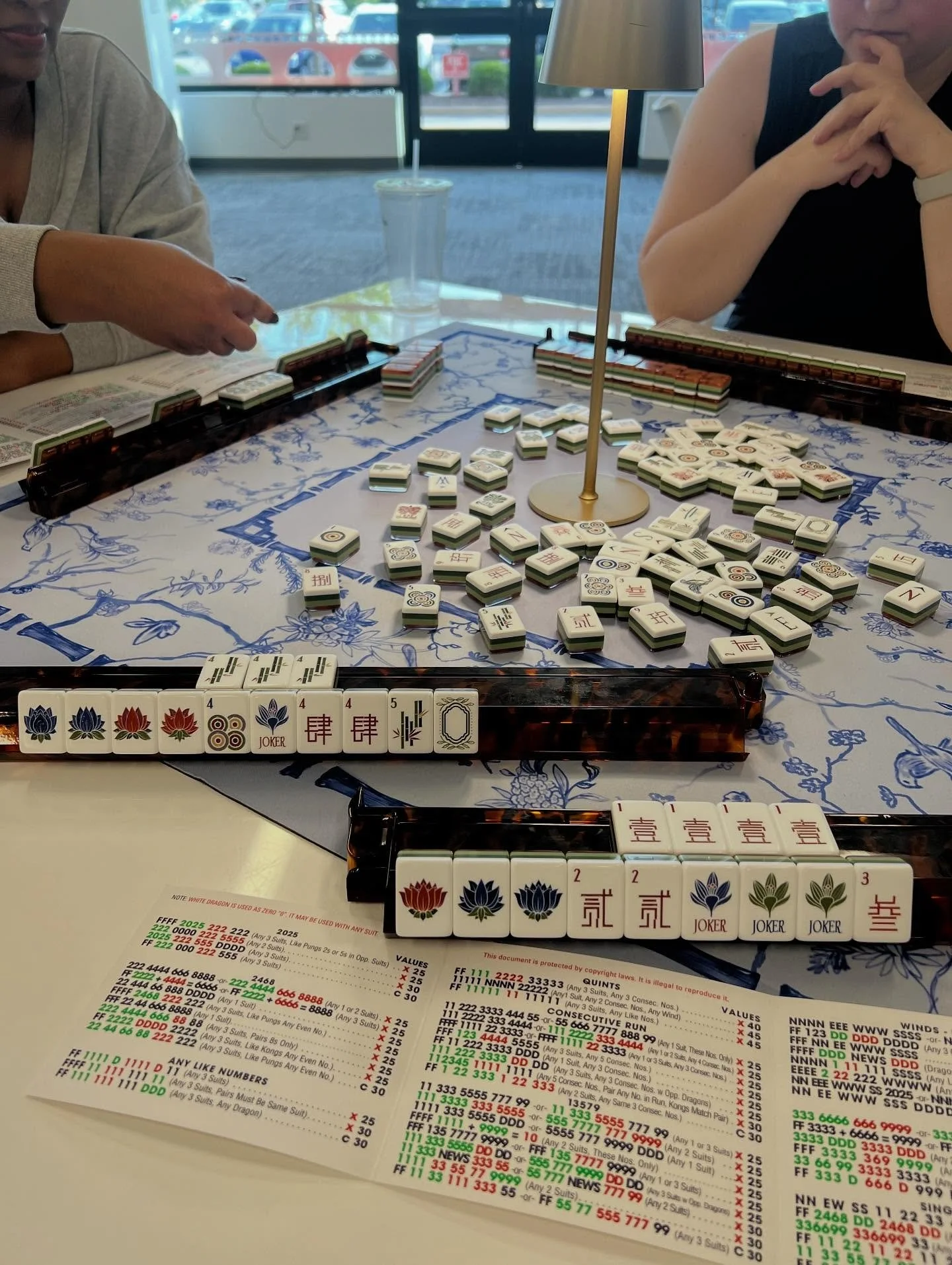 Not recommended (and not NMJL-approved): playing two hands at once in a four person game 😂 

We did this just for fun while waiting on our fourth - it was quite the challenge (and definitely unbalanced the true strategy with me seeing twice as many 