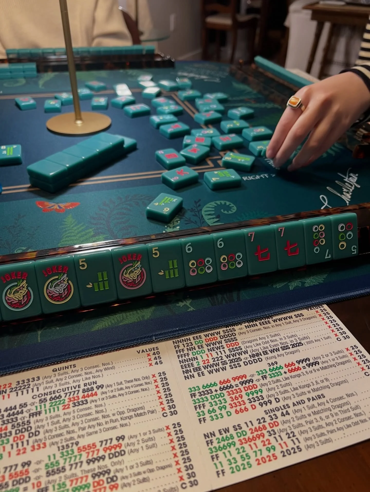 I cannot count the number of times that I sit back and realize I love this game, still. Tonight it was when my 5yo wanted to be dealt in with her own hand (quickly abandoned in favor of sitting on my lap and calling out my discards). Then again when 