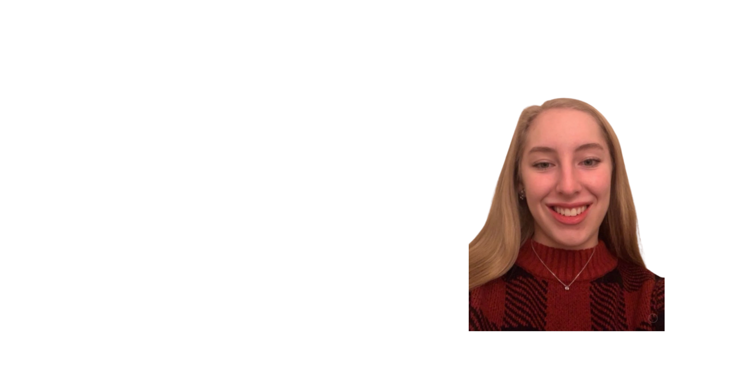 Smiling young woman with long blonde hair wearing a red and black plaid sweater and a silver necklace, against a plain white background.