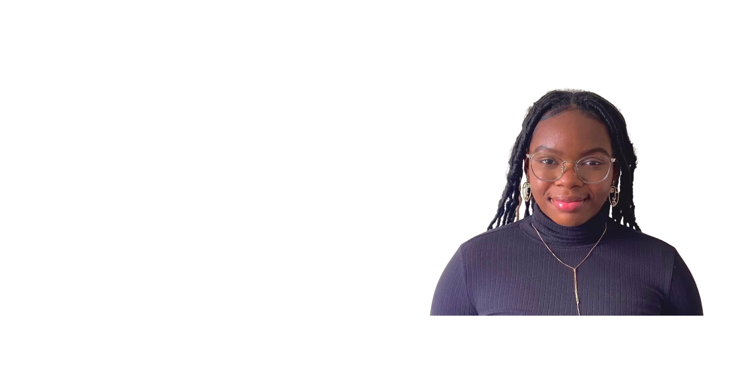 A woman with glasses and long braided hair, wearing a black turtleneck, silver earrings, and a gold necklace, looking at the camera with a slight smile.