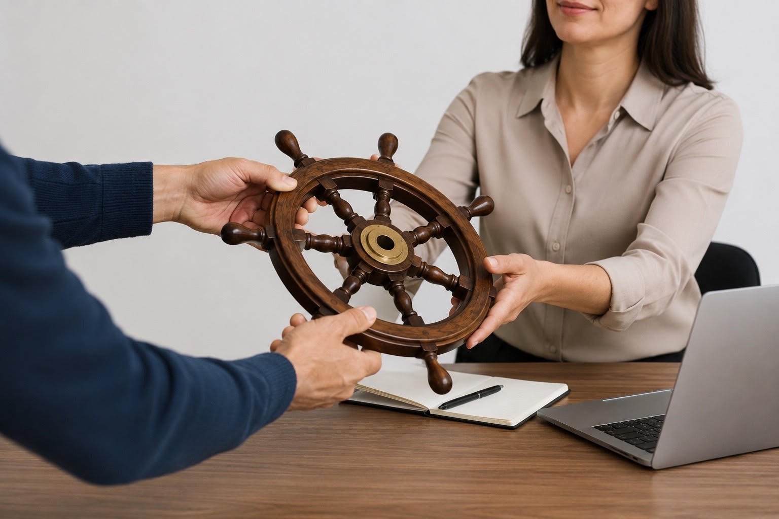 manager handing the wheel to employee. delegating with trust