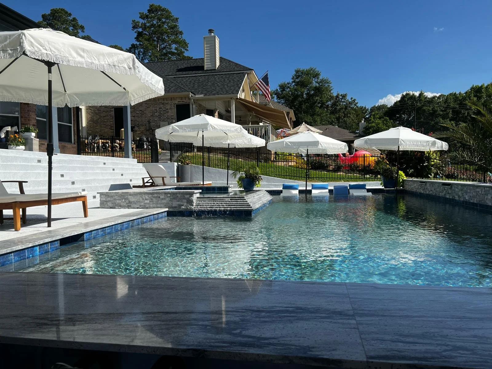 View from the pavilion swim-up-bar!  Enjoy a full view to the pool deck while kids play, and you relax in the cool shade.