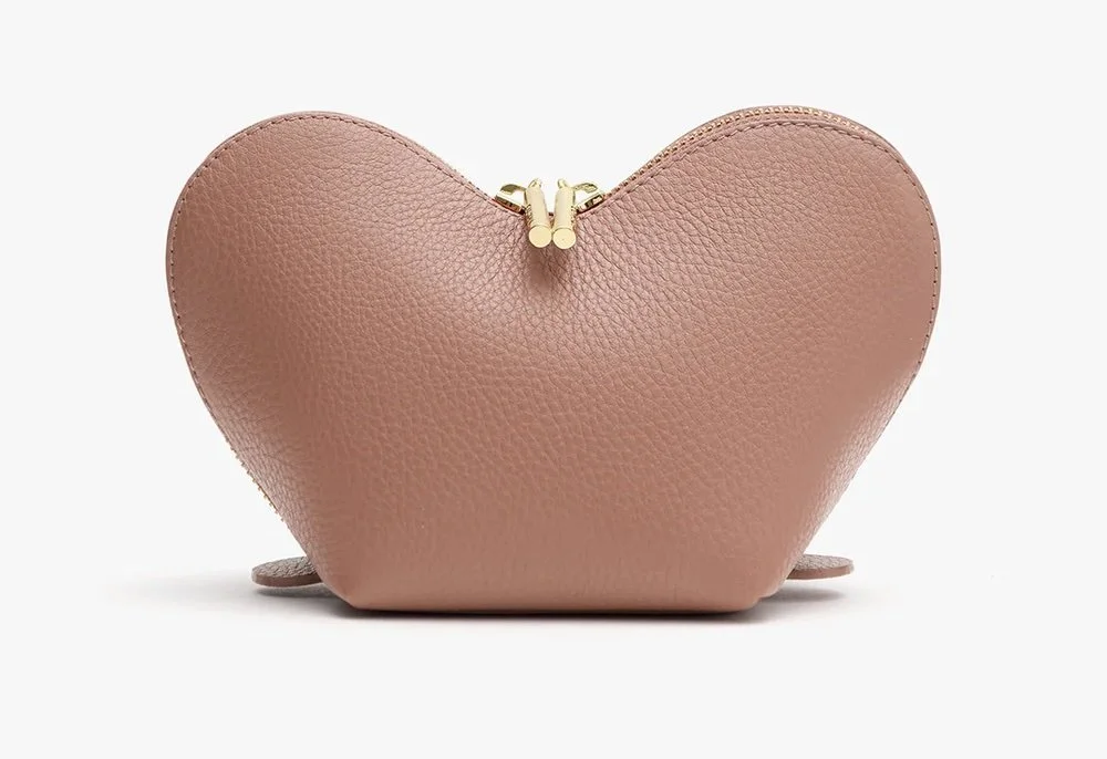 Pink heart shaped wallet bag from Cuyana