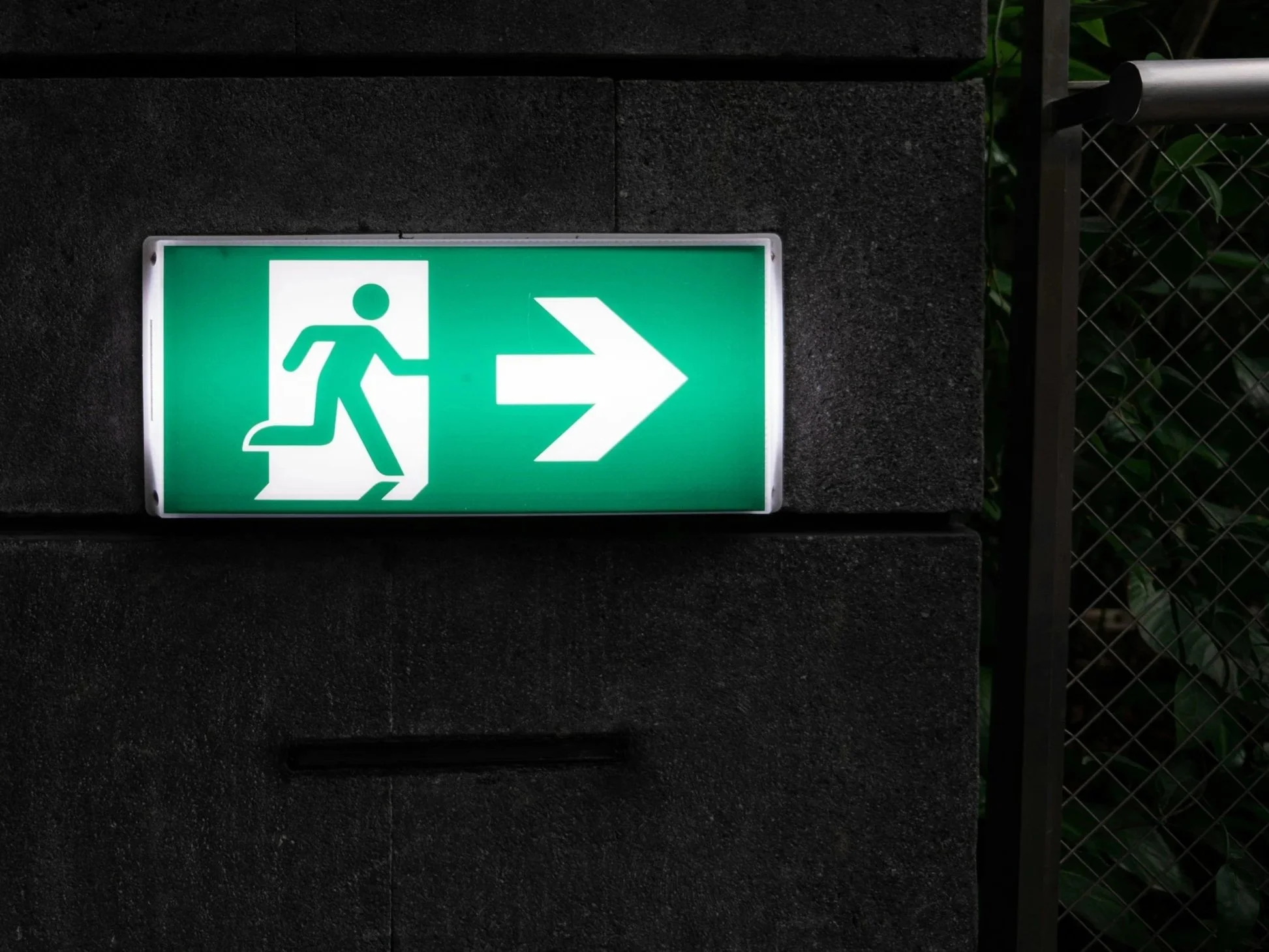 Oranssi technician working on a roof project