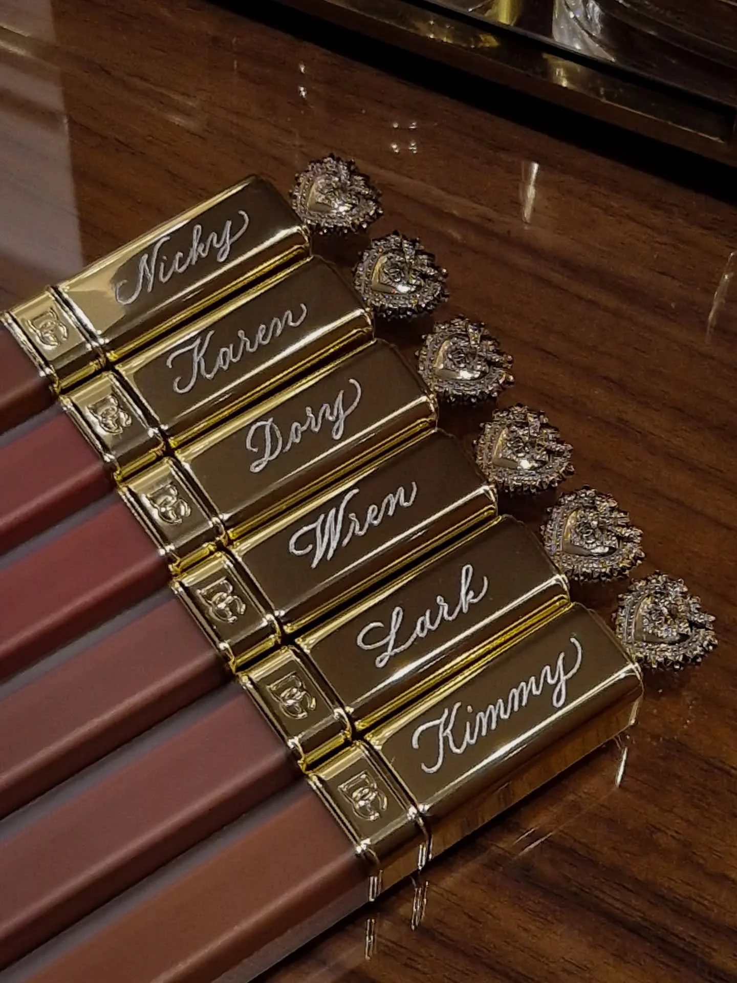 Being able to engrave my calligraphy on so many surfaces means I can create one of a kind keepsakes like this 🩷 A special gift from a bride to her bridesmaids - don't they look beautiful all lined up?

Get in touch for bespoke calligraphy and engrav