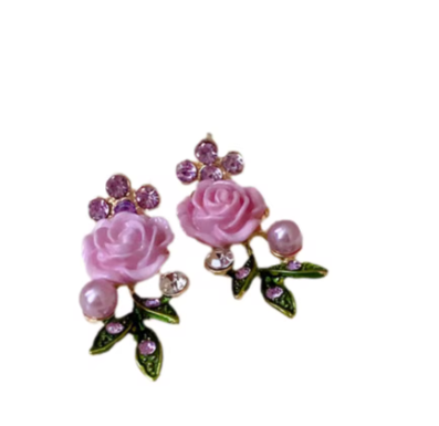 purple rossette earrings.png