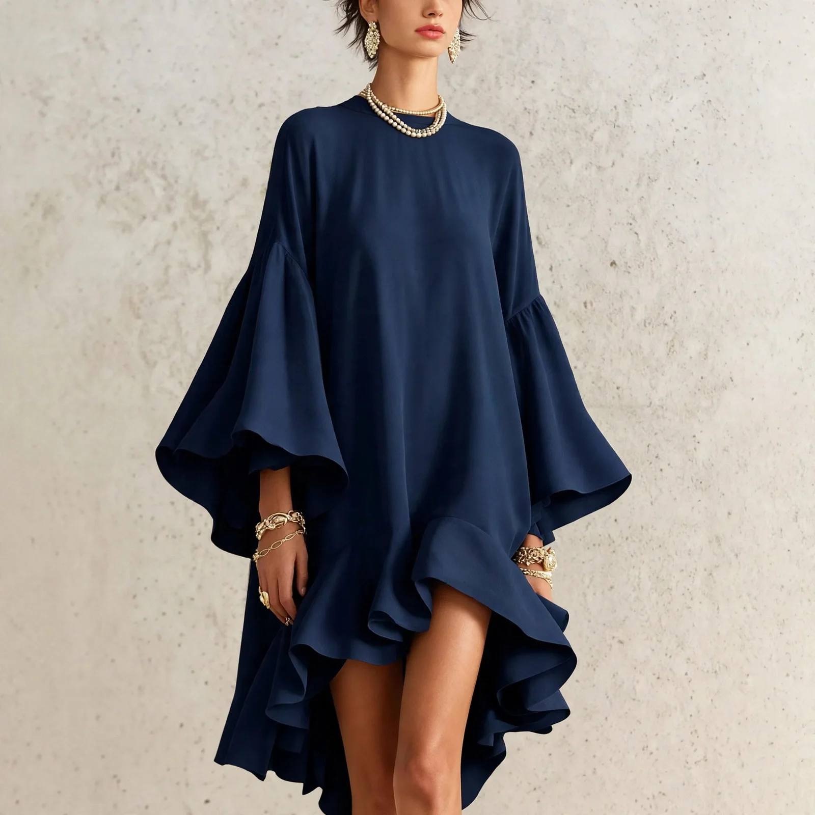 navy_dress_beige_wall.webp