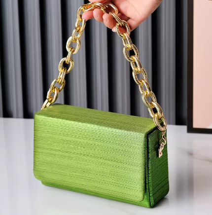 green clutch bag.png