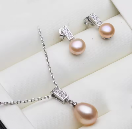 925 pink pearl necklace and earring set.png