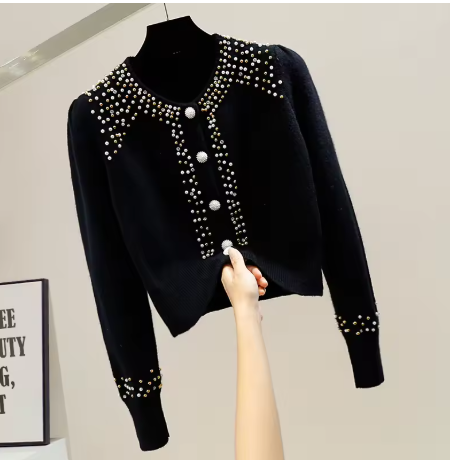 black beaded sweater.png