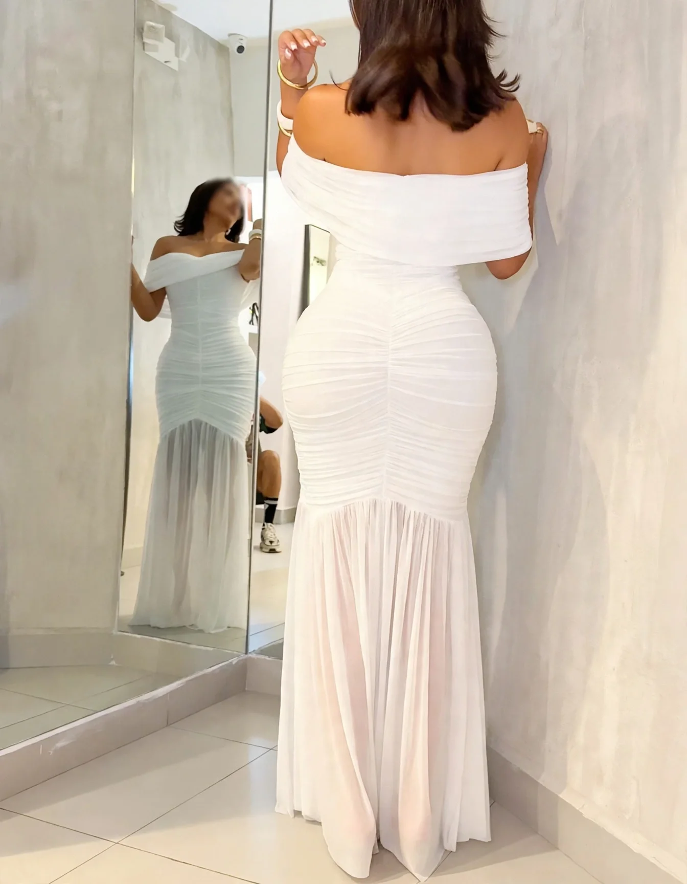 back of white mesh dress.webp