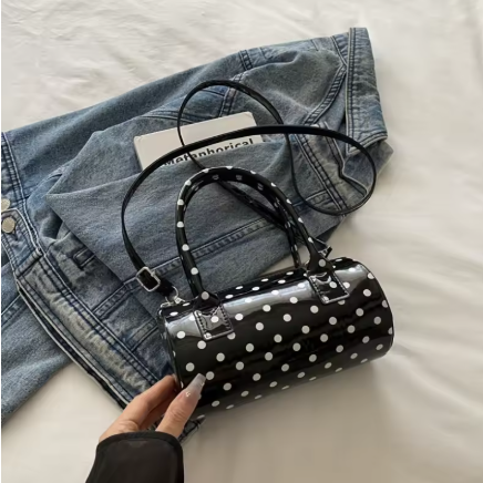 black and white polka dot handbag.png