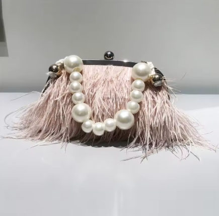 pink pearl handle handbag.png