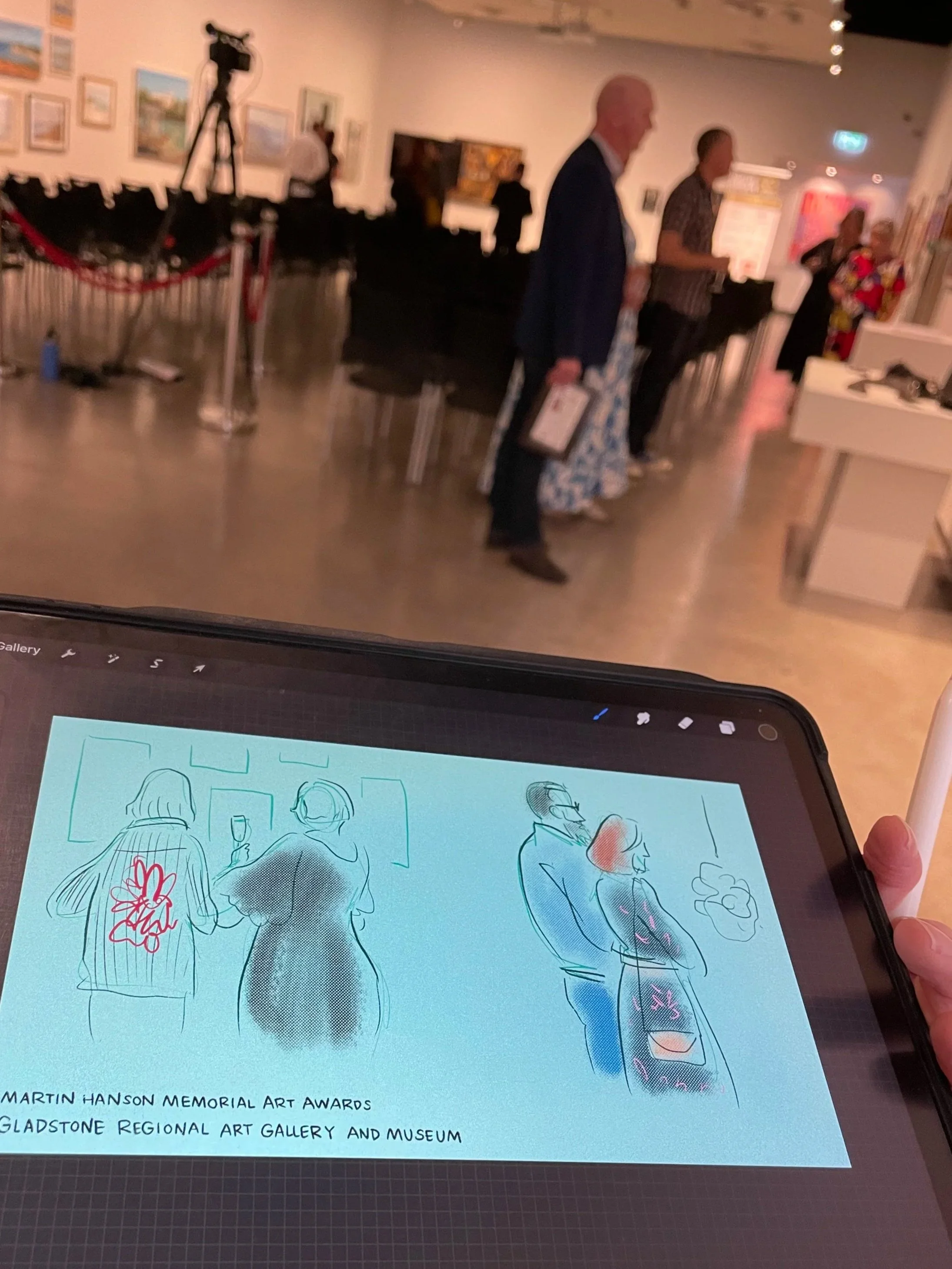 Person drawing on a tablet with a stylus, creating a cartoon portrait of a woman with long dark hair and glasses, with handwritten notes in pink above the illustration.
