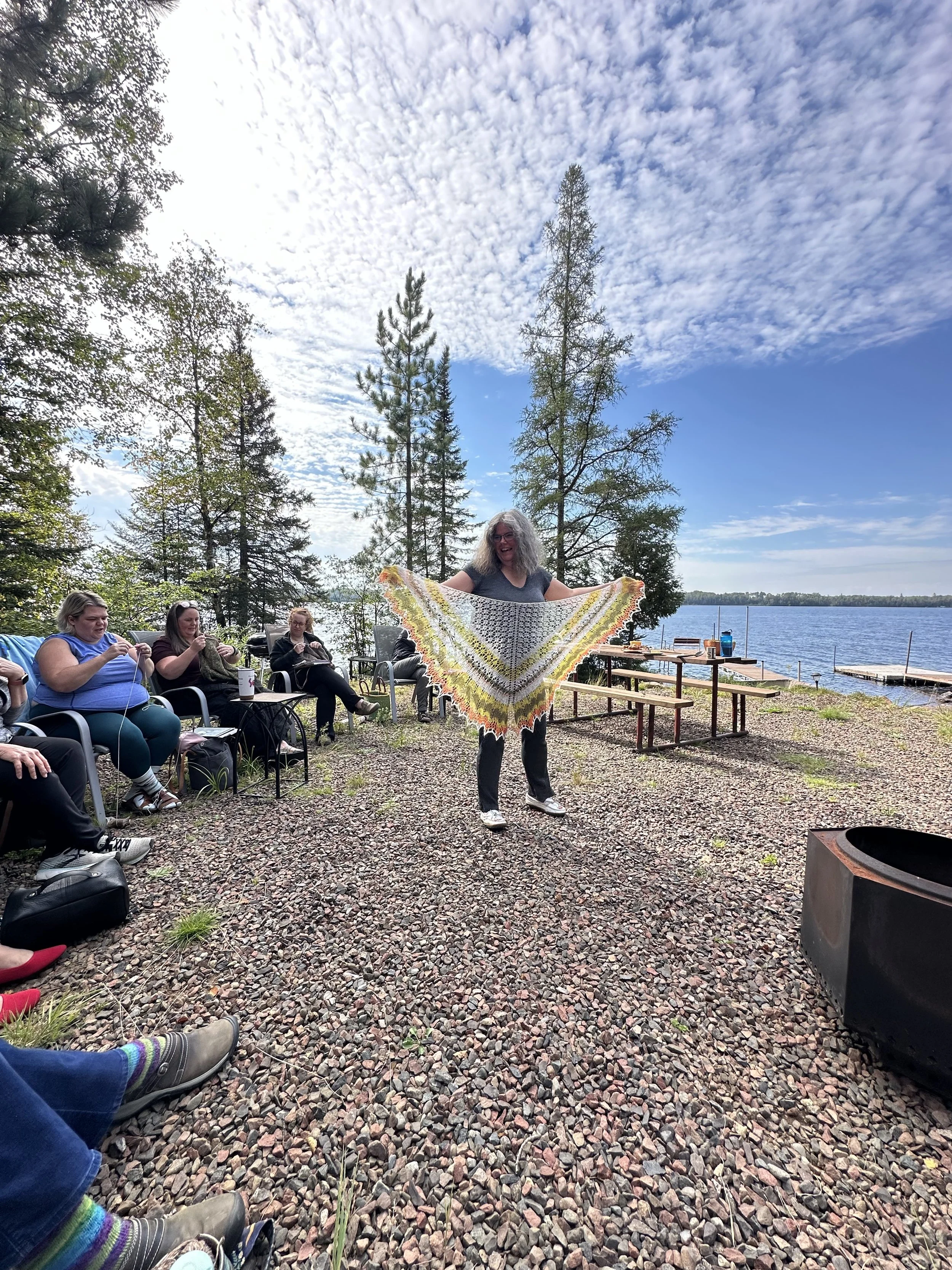 Showing of a finished lace knit shawl