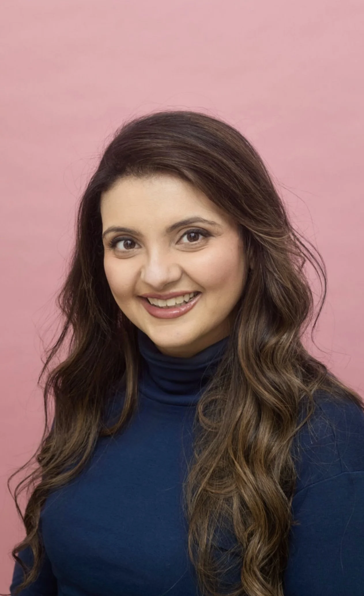 Irfa, founder of Glow Mental Health, specializing in perinatal and trauma therapy.