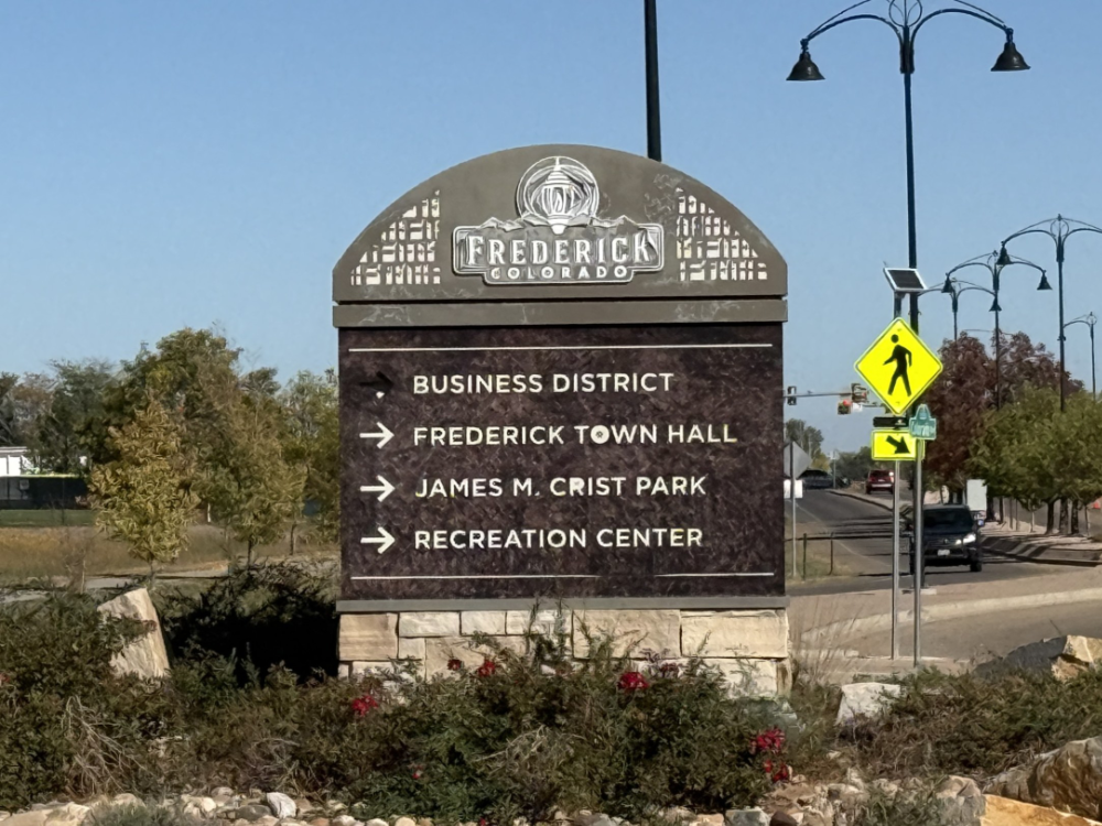 Frederick Colorado monument sign in the traffic circle at Colorado Blvd and 5th Street showing directions to nearby locations within the Better Business Cleaning Frederick service area
