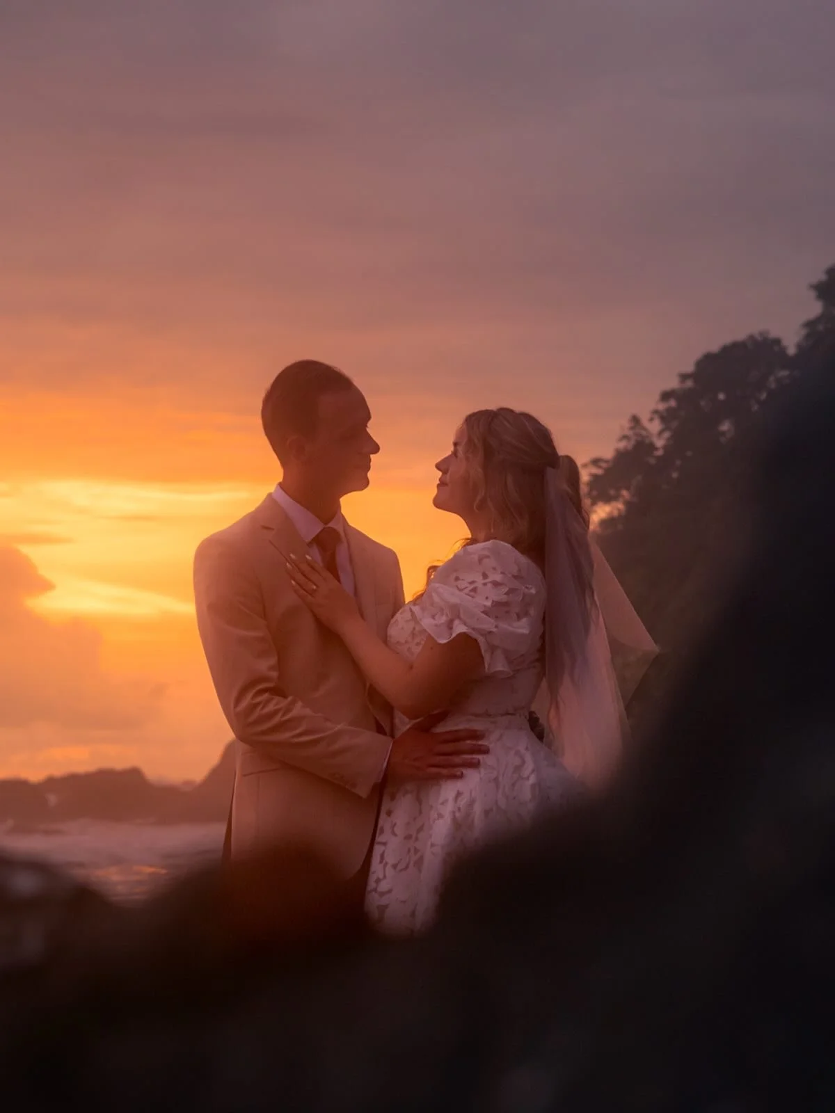 Magic in the Air

Nearly a year ago I was lucky enough to photograph this beautiful couple and their wedding in beautiful Costa Rica. Still to this day, I can remember the magic in the air as the glowing sun set gently on a warm summer night.

Shot o
