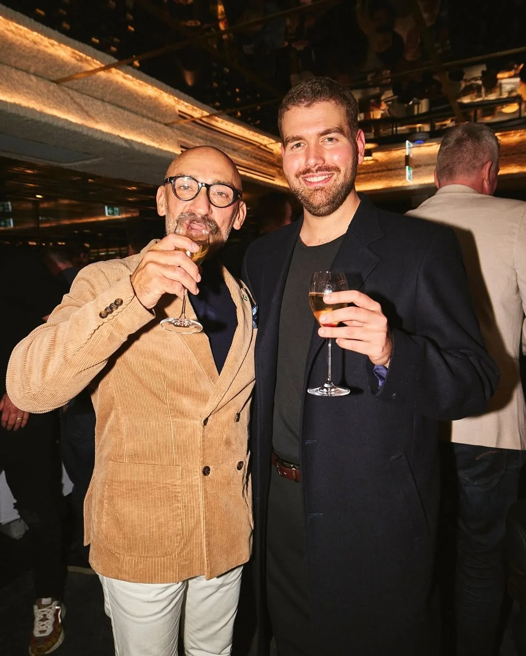 Guests toasting with champagne at a Blackbird Melbourne cocktail function