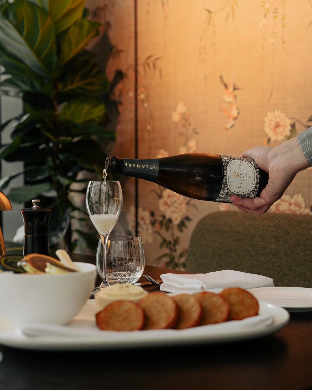 Champagne being poured tableside at Blackbird Melbourne