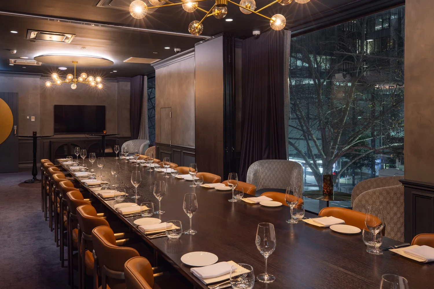 Rooms 2 and 3 at Blackbird Melbourne opened into a single long table beneath brass pendant lighting