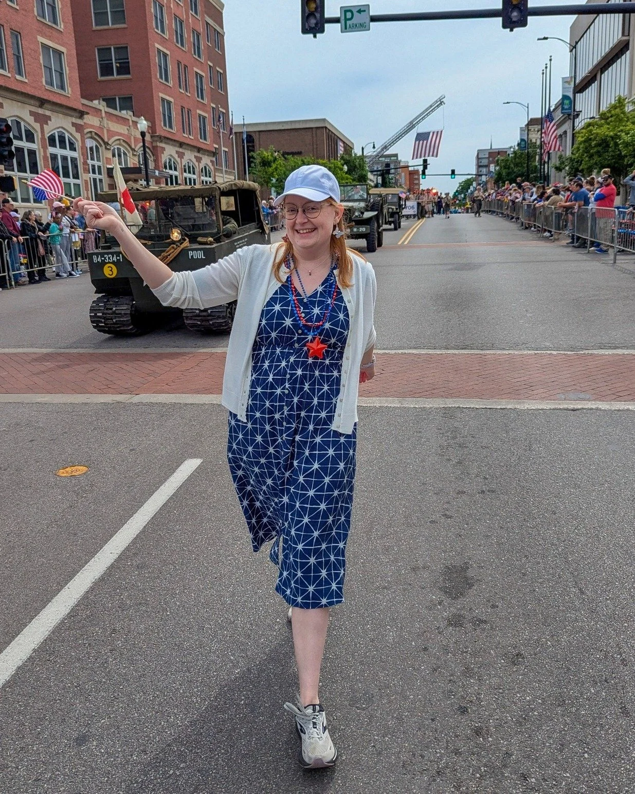 Vera Elwood Ward 2 Council City of Columbia candidate at the Gold Star Memorial Parade waving an American Flag