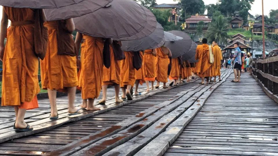 monk-walk-wooden-bridge-sangkhlaburi-thaiand.jpg