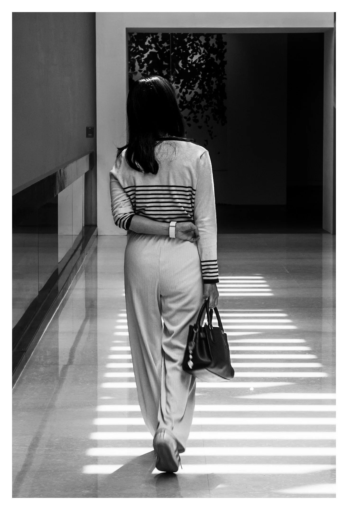 Day 143/365 Chasing the Rhythm of the Corridor: A Masterclass in Monochrome Geometry