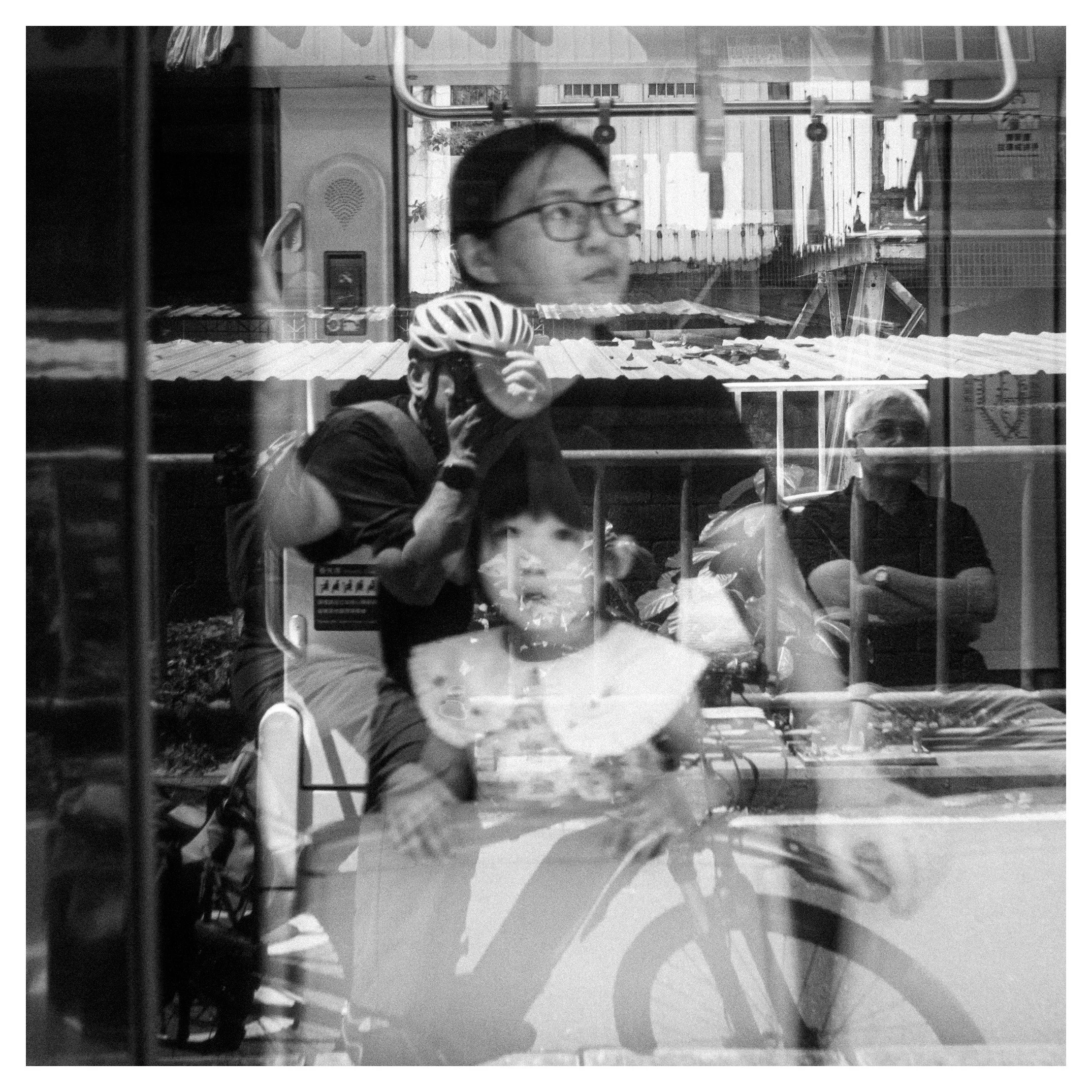 Day 174/365 Echoes in the Glass: The Ghostly Layers of the Kaohsiung Light Rail