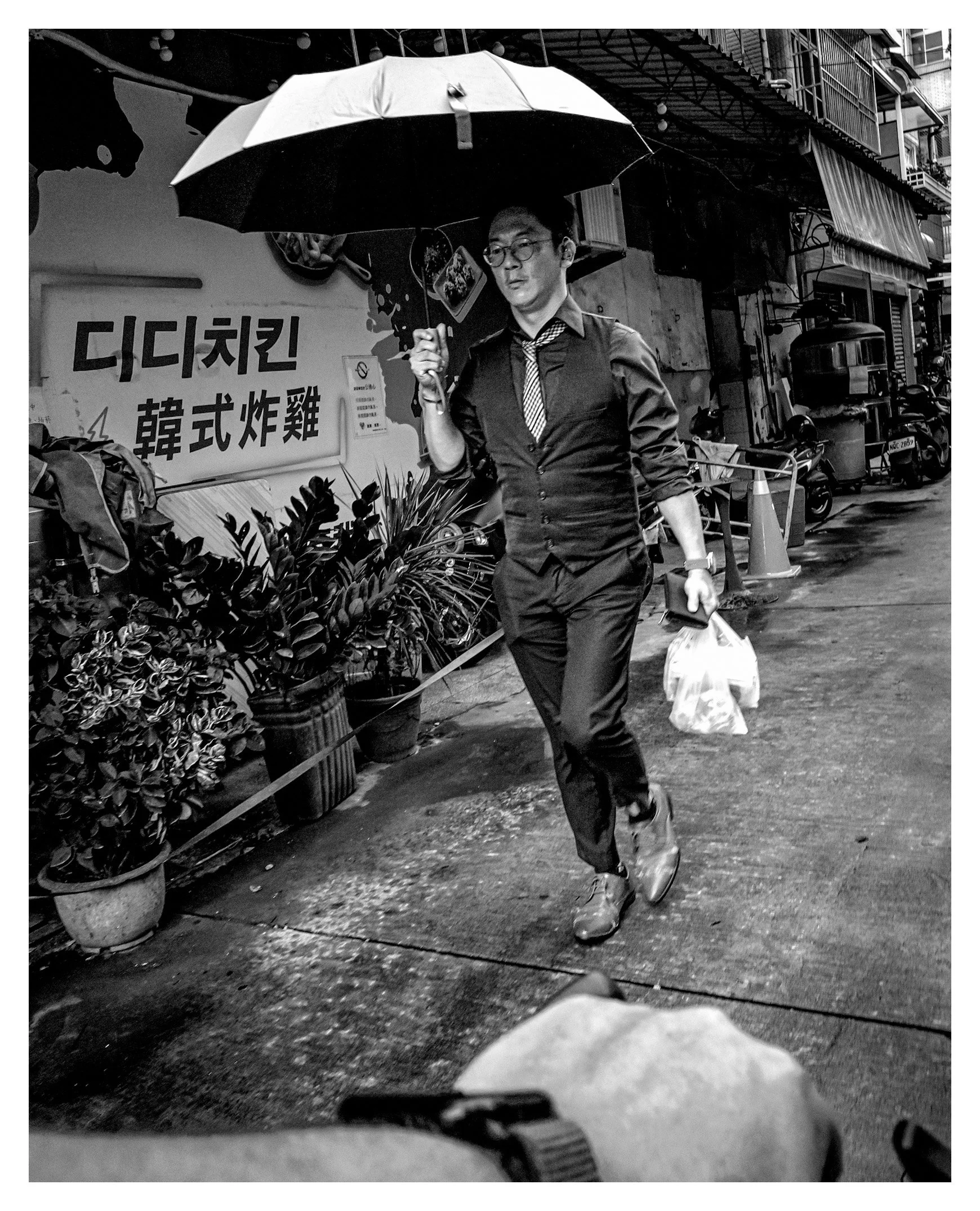 Day 277/365 The Rainmaker: A Study in Motion and Wide-Angle Chaos