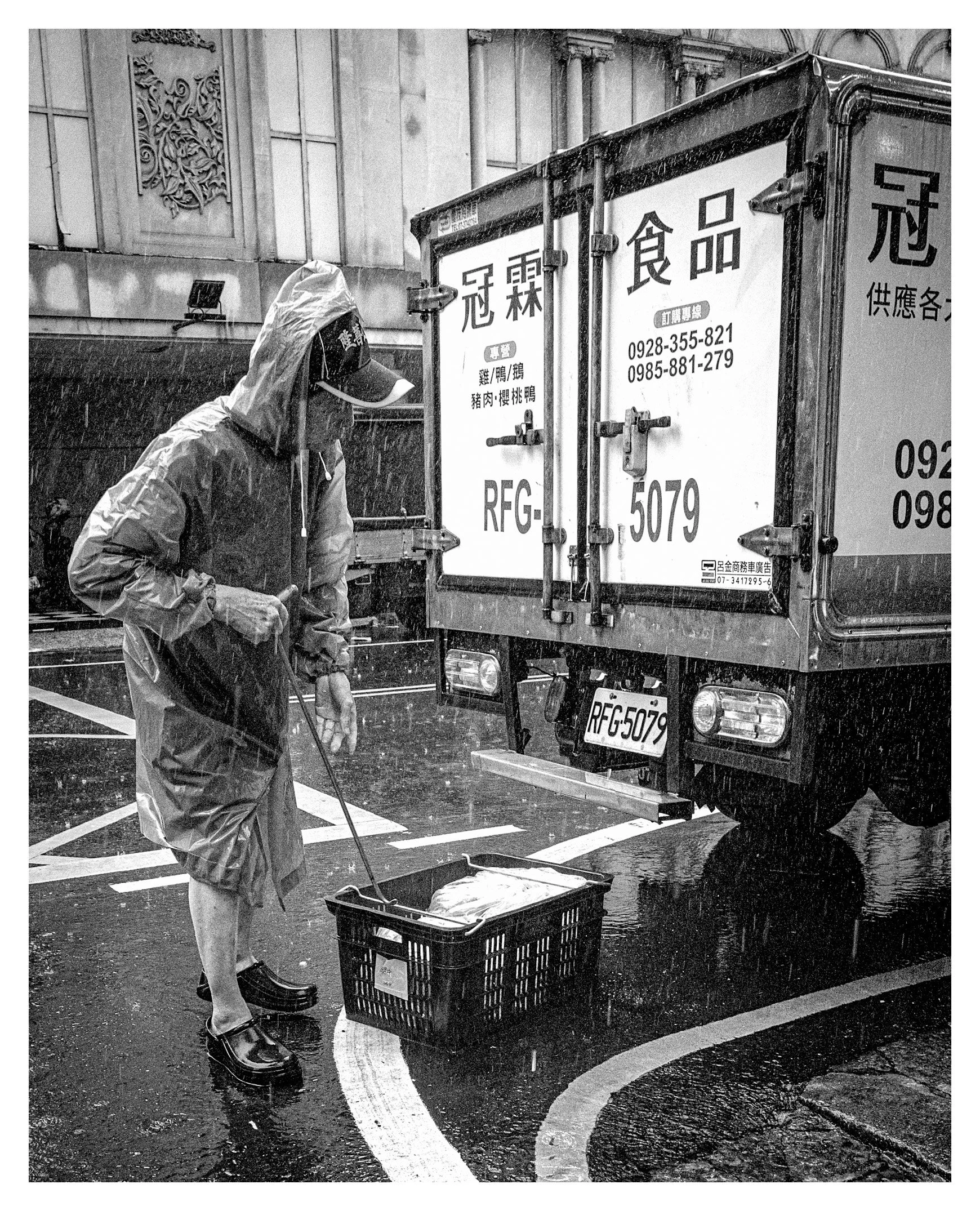 Day 315/365 Faceless in the Downpour: One Hook, One Crate, and a Kaohsiung Delivery in the Rain